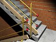 Sistema provisional de protección de hueco de escalera en construcción, con barandilla